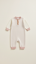 Cashmere romper with pearl buttons